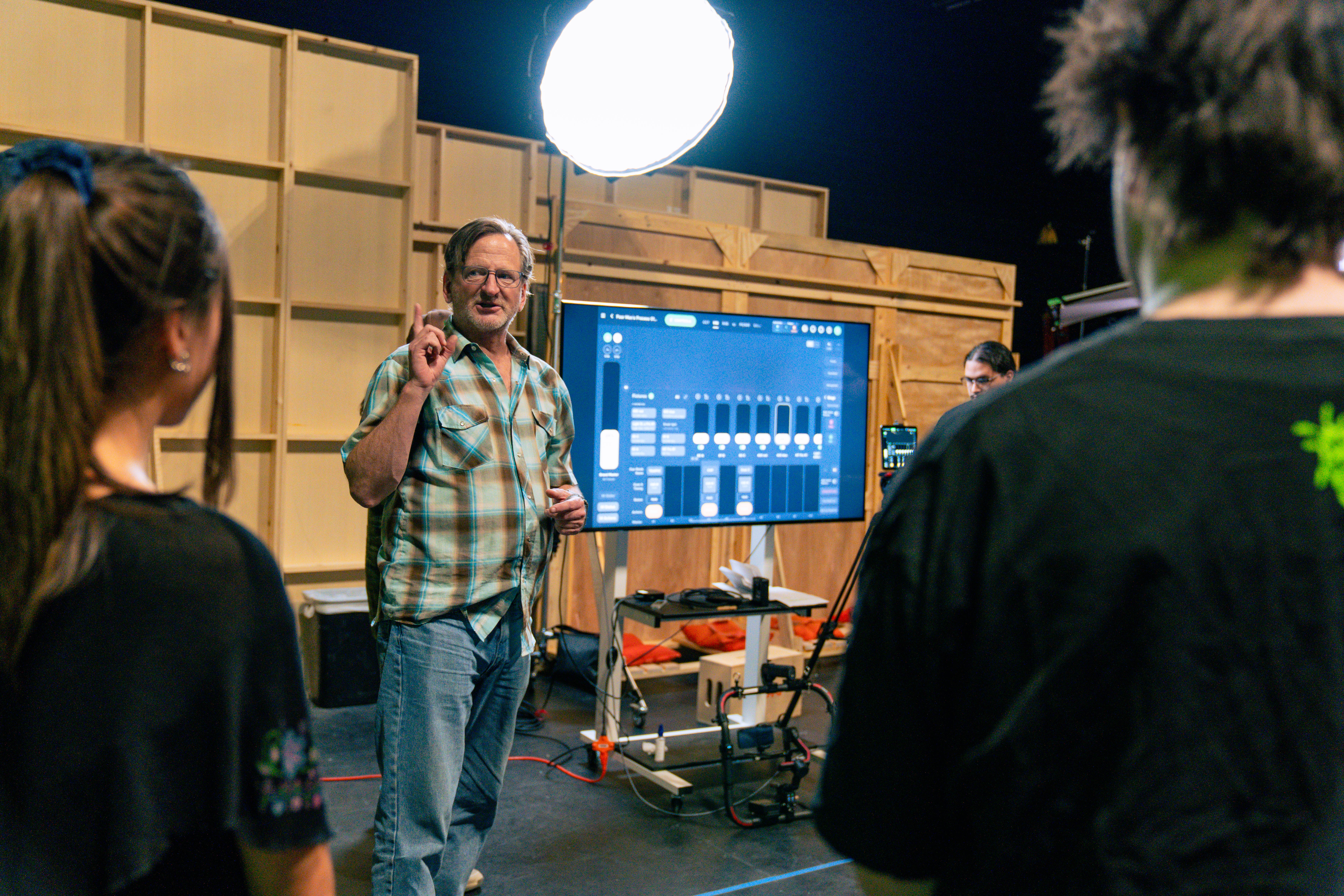 a teacher demonstrating a software